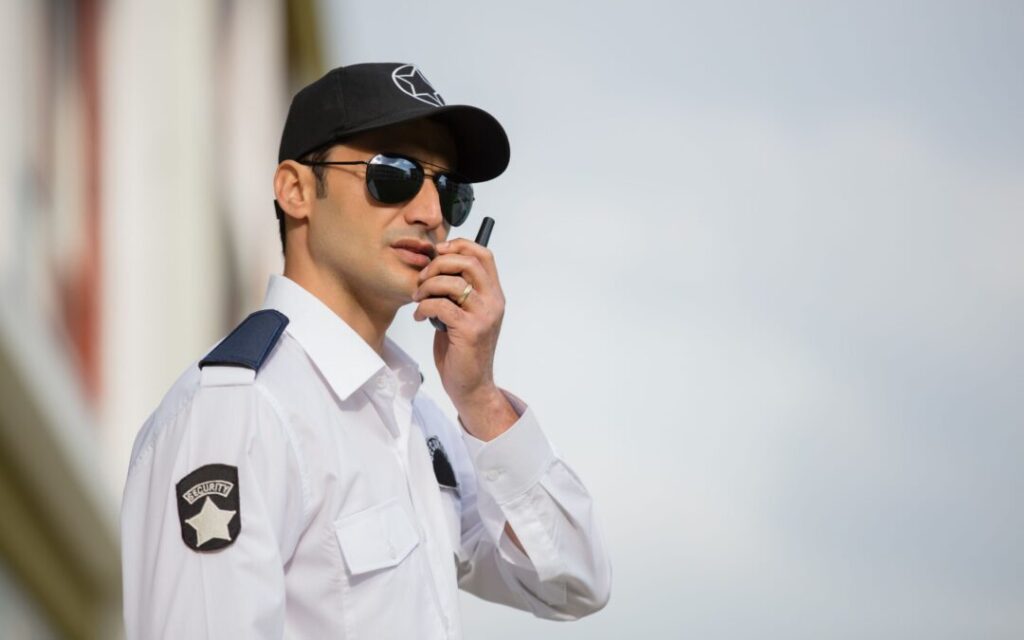 Security guard on phone